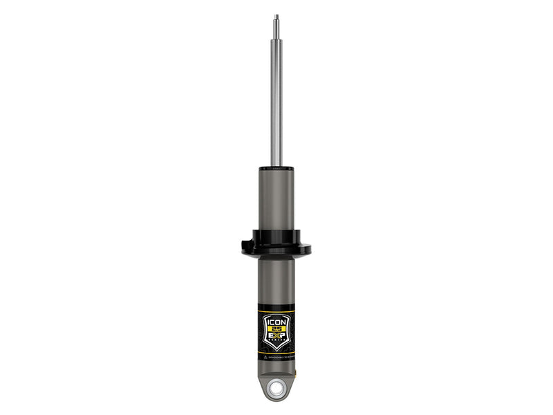 ICON Vehicle Dynamics 2.5 EXP Series Coilover: ICON 2.5 EXP series coilover shock body with black spring perch, stem top and eyelet base, straight-on, on white; no spring