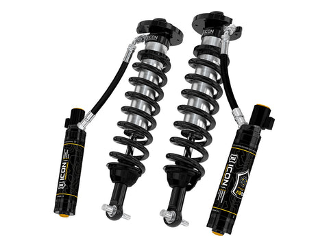 ICON Vehicle Dynamics 2.5 Series Coilover Kit: a pair of ICON 2.5 VS remote-reservoir coilovers with black springs and tall black CDEV electronic reservoirs with connectors, rendered on white