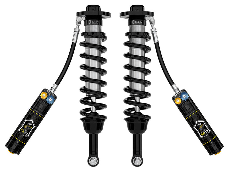 ICON Vehicle Dynamics 2.5 Series Coilover Kit: a pair of ICON 2.5 VS remote-reservoir coilovers with black springs and CDXS adjustable reservoirs angled below, on white