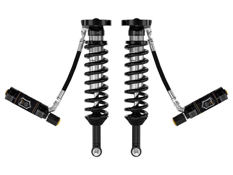 ICON Vehicle Dynamics 2.5 Series Coilover Kit: a pair of ICON 2.5 VS remote-reservoir coilovers with black springs, eyelet bases and black CDEV electronic reservoirs angled out, on white