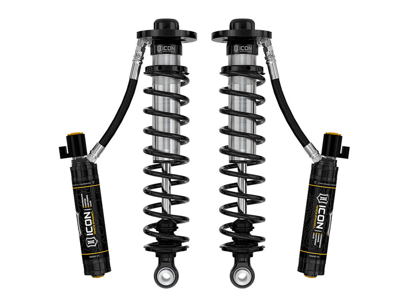 ICON Vehicle Dynamics 2.5 Series Coilover Kit: a pair of ICON 2.5 VS remote-reservoir coilovers with black springs and tall black CDEV electronic reservoirs with connectors, rendered on white (part 91836E)