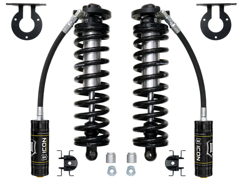 ICON Vehicle Dynamics 2.5 Series Coilover Kit: ICON 2.5 VS remote-reservoir coilover conversion kit on white: two coilovers with black springs, two reservoirs, upper mount brackets, reservoir clamps and spacers