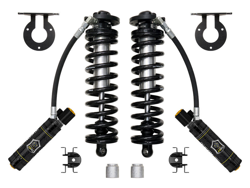 ICON Vehicle Dynamics 2.5 Series Coilover Kit: ICON 2.5 VS remote-reservoir coilover conversion kit on white: two coilovers with black springs, two reservoirs, upper mount brackets, reservoir clamps and spacers (part 61723E)