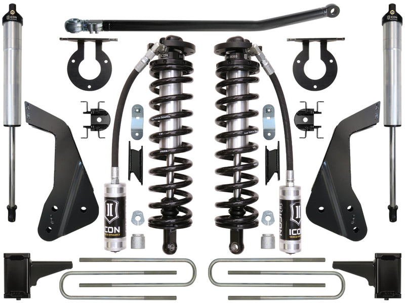 Kit layout on white: two ICON 2.5 remote-reservoir coilovers, two rear shocks, adjustable track bar, coil towers, frame brackets, block mounts and U-bolts.
