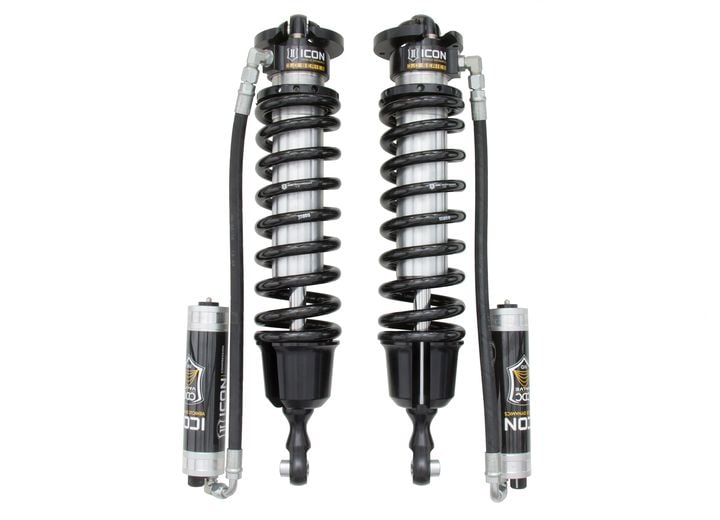 A pair of ICON 3.0 VS remote-reservoir coilovers with black springs and CDC Valve reservoirs, on white; smaller in frame.