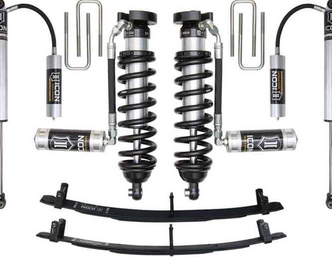 Studio kit layout on white: kit: remote-reservoir front coilovers, rear remote-reservoir shocks, rear leaf packs and U-bolts.