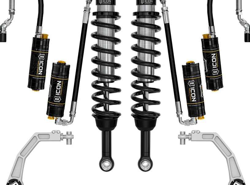 Studio kit layout on white: kit: pair of remote-reservoir front coilovers, rear remote-reservoir shocks and billet UCAs.