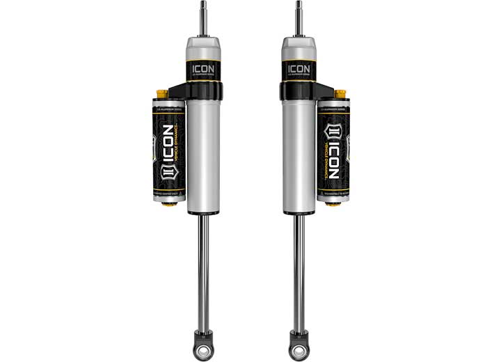 Rendered pair of silver ICON 2.5 aluminum series shocks with clamped piggyback reservoirs, stem tops and eyelet bases on white.