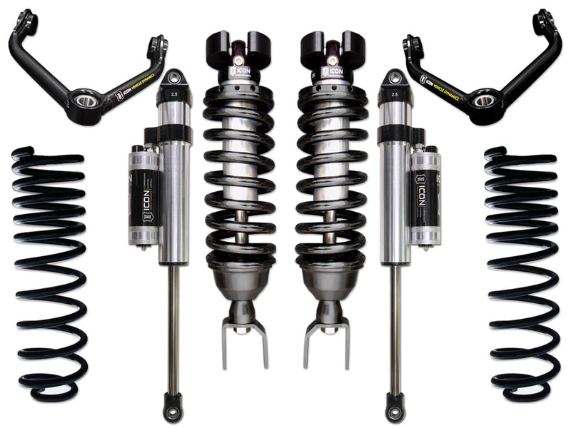 Studio kit layout on white: kit: pair of front coilovers, rear piggyback shocks, rear coil springs and tubular UCAs.