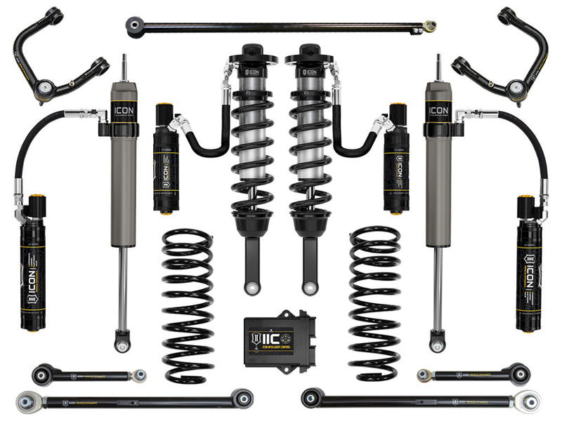 Studio kit layout on white: kit with IIC control module: remote-reservoir front coilovers, rear remote-reservoir shocks, rear coil springs, tubular UCAs, rear links and track bar.