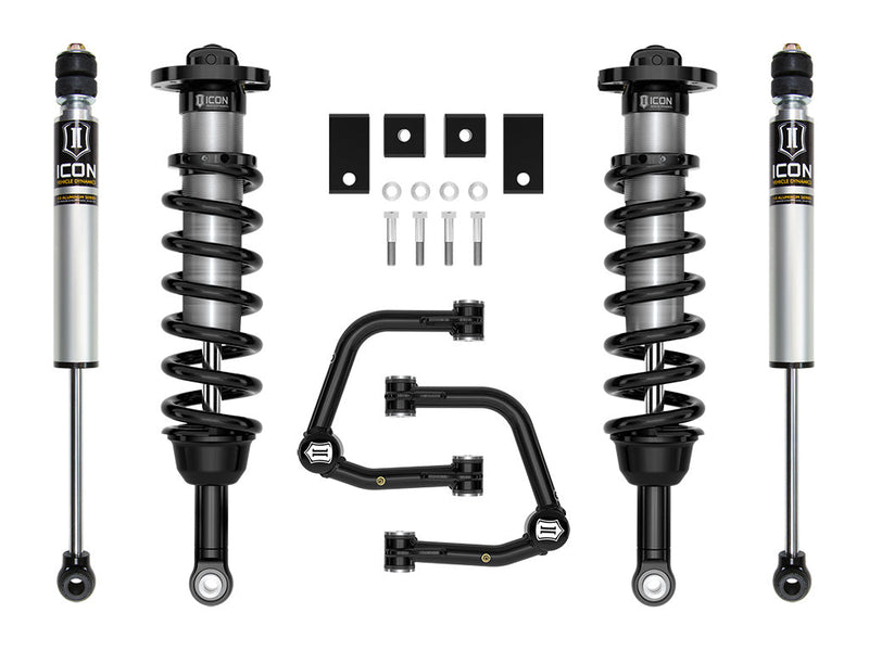 Studio kit layout on white: kit: pair of front coilovers, rear shocks, tubular UCAs, spacers and hardware.