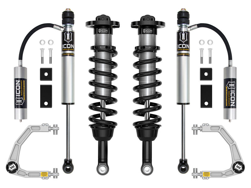 Studio kit layout on white: kit: pair of front coilovers, rear remote-reservoir shocks, billet UCAs, spacers and hardware.