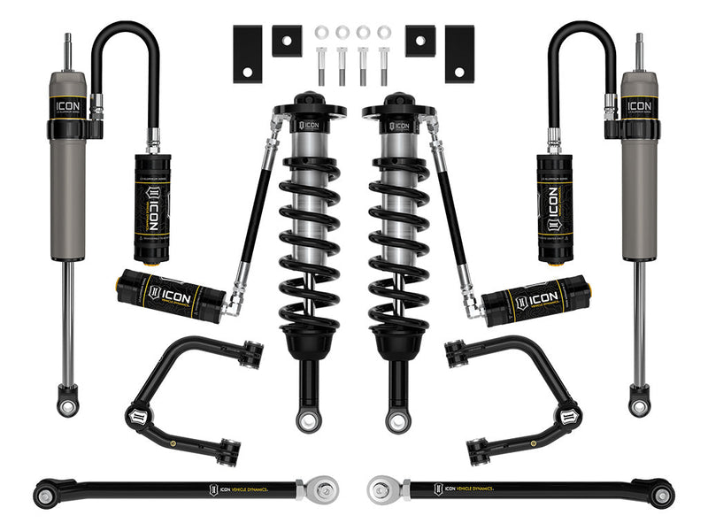 Studio kit layout on white: kit: remote-reservoir front coilovers, rear remote-reservoir shocks, tubular UCAs, rear links, spacers and hardware.