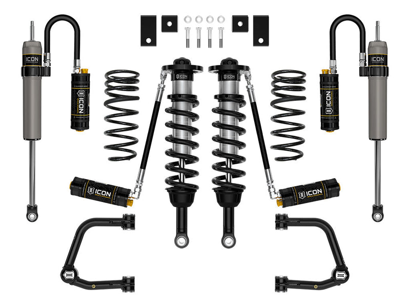 Studio kit layout on white: kit: remote-reservoir front coilovers, rear remote-reservoir shocks, rear coil springs, billet UCAs, spacers and hardware.