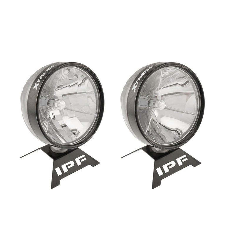 Two IPF Xtreme LED Sport driving lights displayed on branded IPF stands, round black-bezel housings with deep chrome tri-wall reflectors, a central LED emitter and XTREME LED SPORT lettering around the bezel