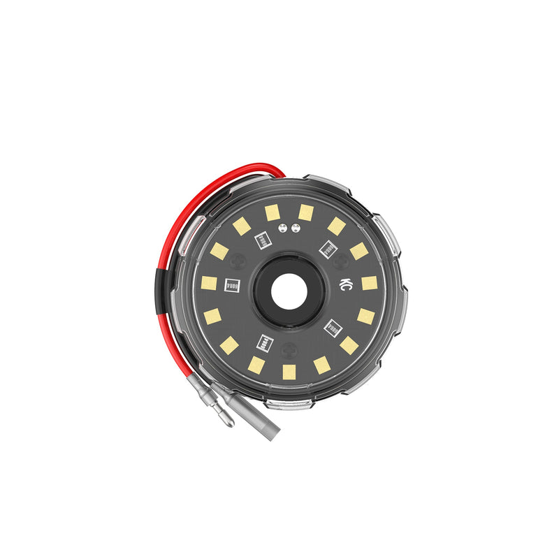 KC HiLiTES Cyclone V2 LED Light on a studio background: front view of a round clear LED light with a ring of white LEDs and red and black leads on white