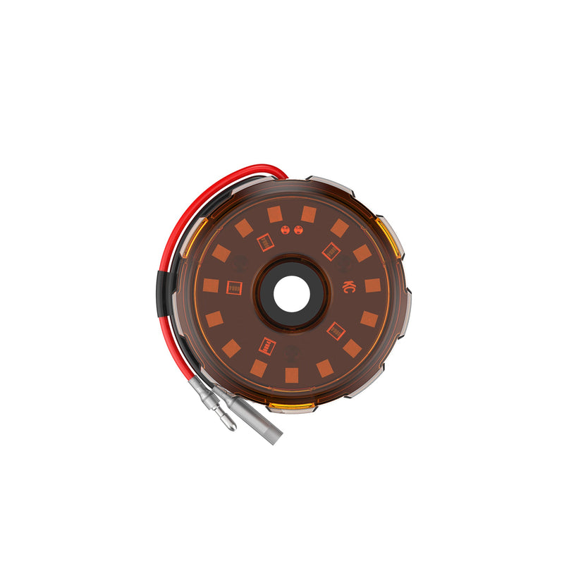 KC HiLiTES Cyclone V2 LED Light on a studio background: front view of a round LED light with an amber lens and red and black leads on white