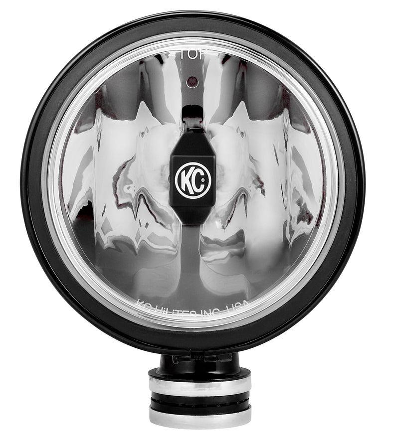 KC HiLiTES Daylighter 6" Gravity LED Light on a studio background: front view of a black round LED light with a clear lens, faceted chrome reflector and KC logo on the center module, on white