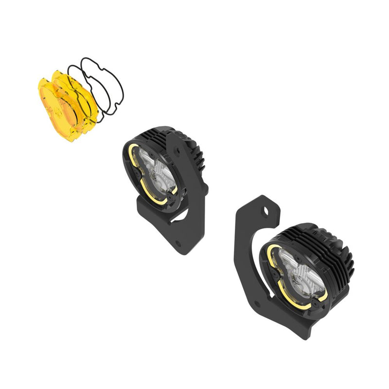 KC HiLiTES FLEX ERA 3 Dual-Mode SAE Fog Light Kit, Steel Bumper on a studio background: exploded view of two FLEX ERA 3 fog lights seated in steel bumper brackets with a yellow lens set