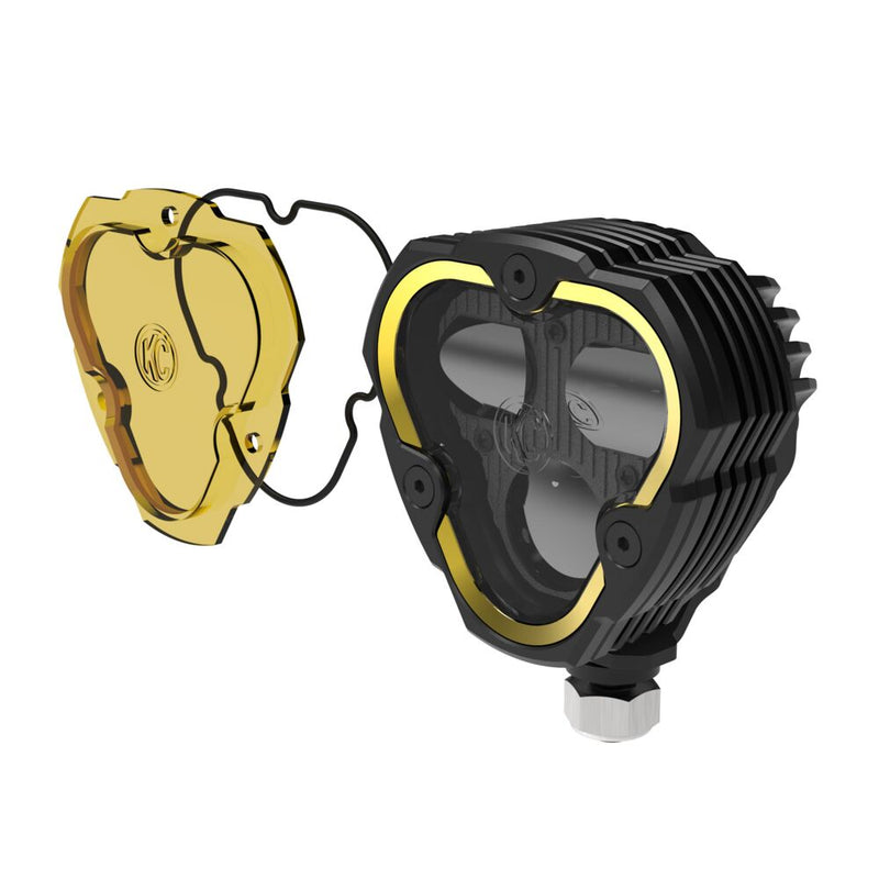 KC HiLiTES FLEX ERA 3 Dual-Mode SAE Fog Light Master Kit on a studio background: A FLEX ERA 3 Dual Mode fog LED light with its selective yellow lens and gasket shown separated on a white background
