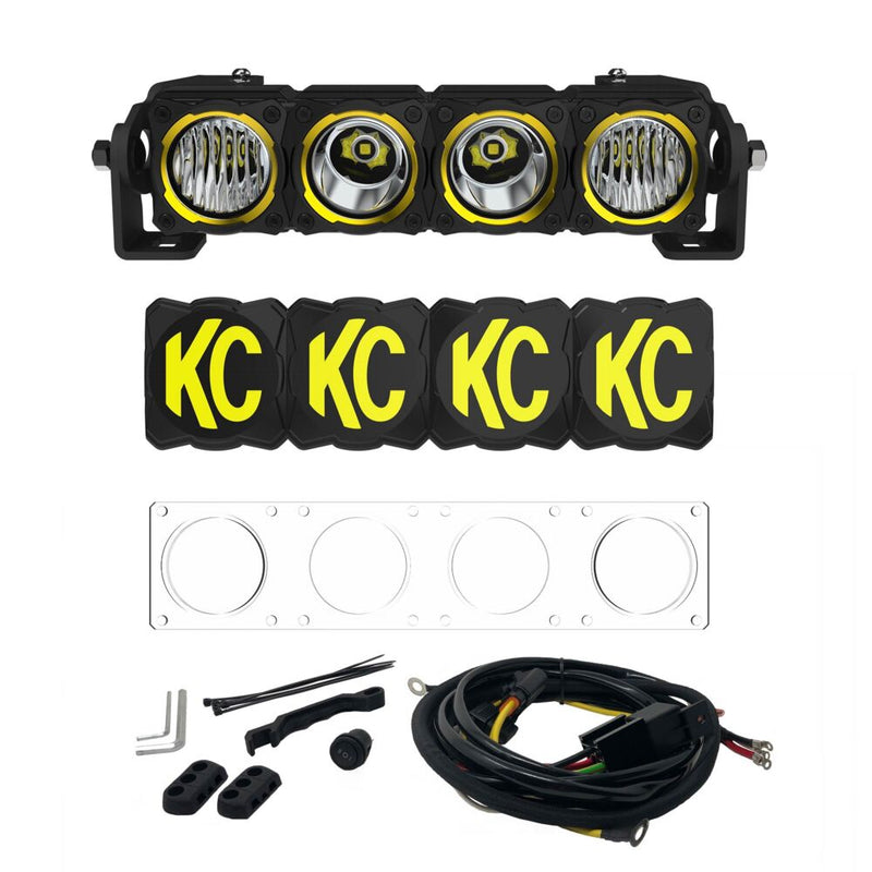 KC HiLiTES FLEX ERA LED Light Bar Master Kit on a studio background: KC FLEX ERA four-module LED light bar with four black KC covers, a clear spot lens, wiring harness and mounting hardware