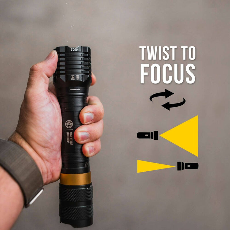 KC HiLiTES FLX 3K Rechargeable Flashlight on a vehicle: hand holding a black flashlight with a gold ring against a gray wall, with a graphic showing twist-to-focus beam widths