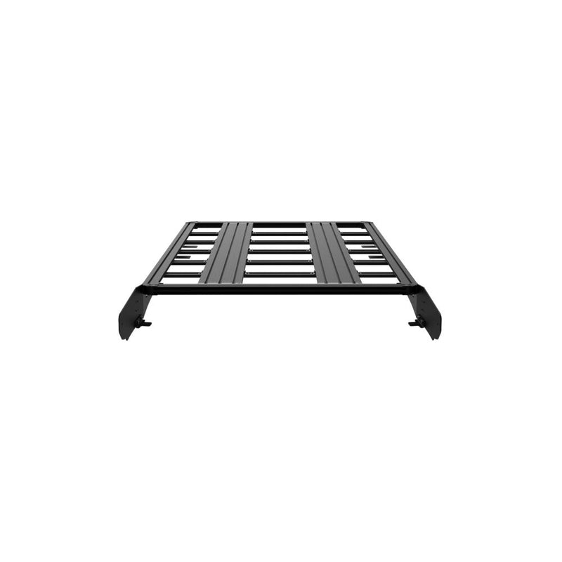 KC HiLiTES Platform One Roof Rack on a studio background: black aluminum KC Platform One roof rack with slotted crossbars and side mounting brackets, front view on a white background