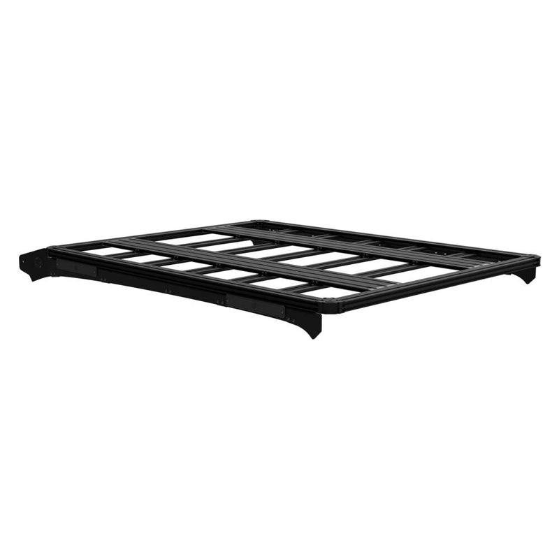 KC HiLiTES Platform One Roof Rack on a studio background: black aluminum Platform One roof rack at a three quarter angle on a white background