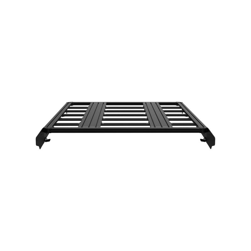 KC HiLiTES Platform One Roof Rack on a studio background: front view of a black Platform One roof rack with mounting feet on a white background