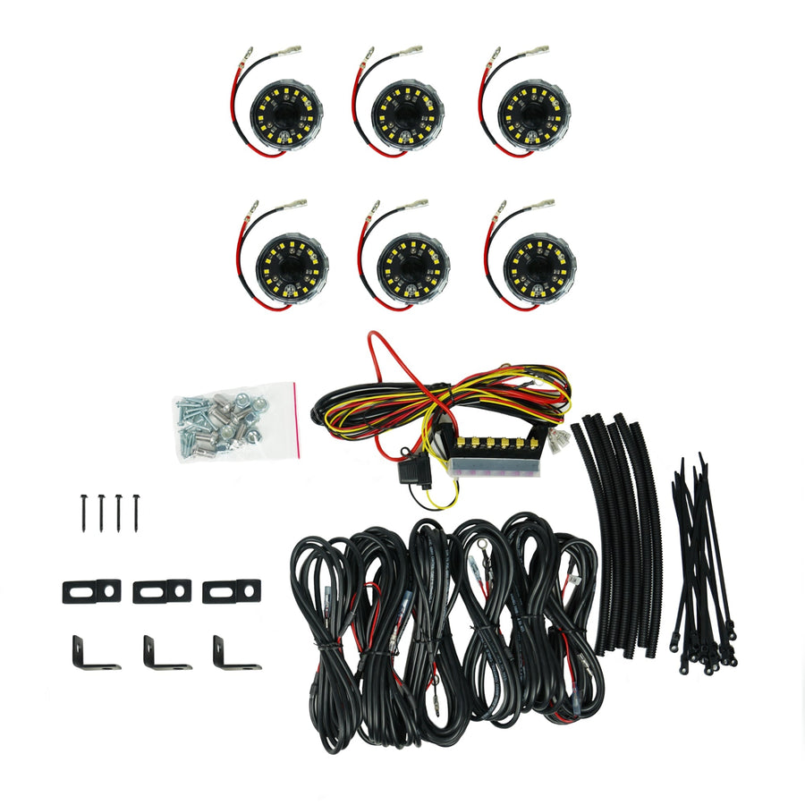 Cyclone V2 LED Lights by KC HiLiTES: Six clear Cyclone V2 rock lights with wiring harness, extension cables, brackets, screws, loom and zip ties on white