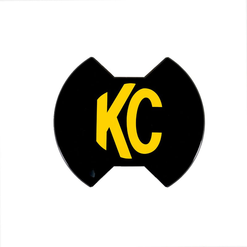 KC HiLiTES SlimLite 6" LED Light Shield on a studio background: black 6" SlimLite hard cover with a yellow KC logo, front view