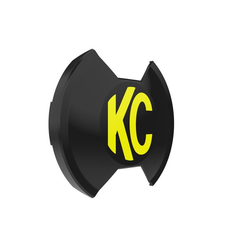 KC HiLiTES SlimLite 8" LED Light Cover & Shield on a studio background: black SlimLite 8" light cover with a yellow KC logo, angled view on white