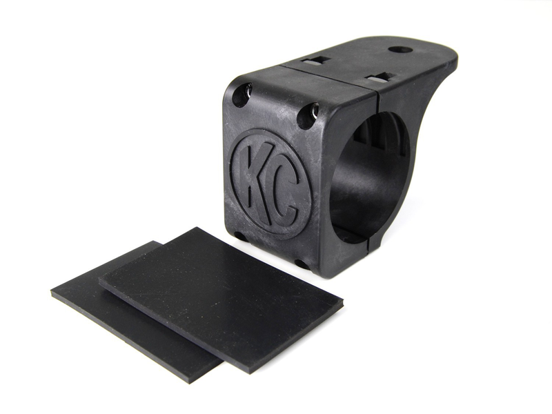 KC HiLiTES Tube Clamp Light Mount on a studio background: single black KC tube clamp light mount with two black rubber adjustment shims on a white background