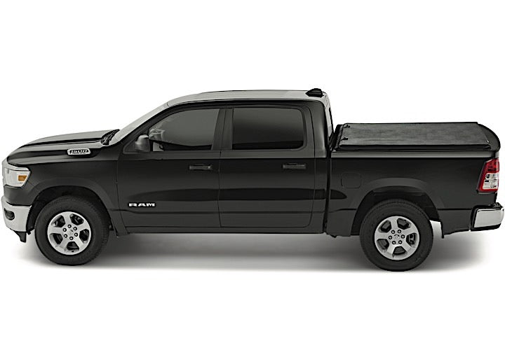 LEER SR250 soft roll-up tonneau cover on a pickup bed: side profile of a black pickup with a low black soft tonneau cover closed over the bed
