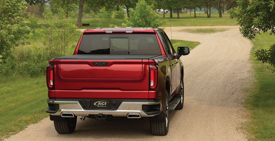 LOMAX hard folding tonneau cover, closed on a GMC Sierra 1500