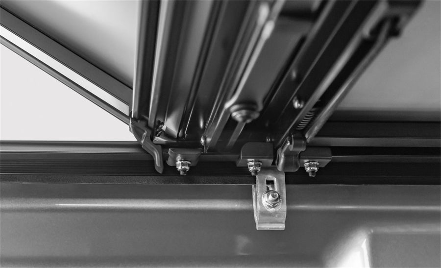 LOMAX STANCE hard folding tonneau cover: rail clamp and hinge hardware