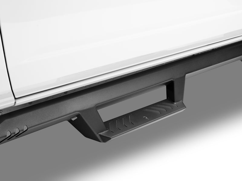N-Fab EpYx nerf steps in textured black, low view, installed along the rocker, on a Ford Bronco