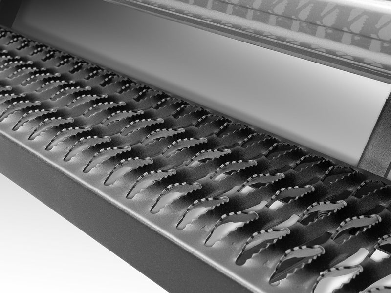 N-Fab Growler Fleet side steps in textured black, step tread macro, on a Ram 1500