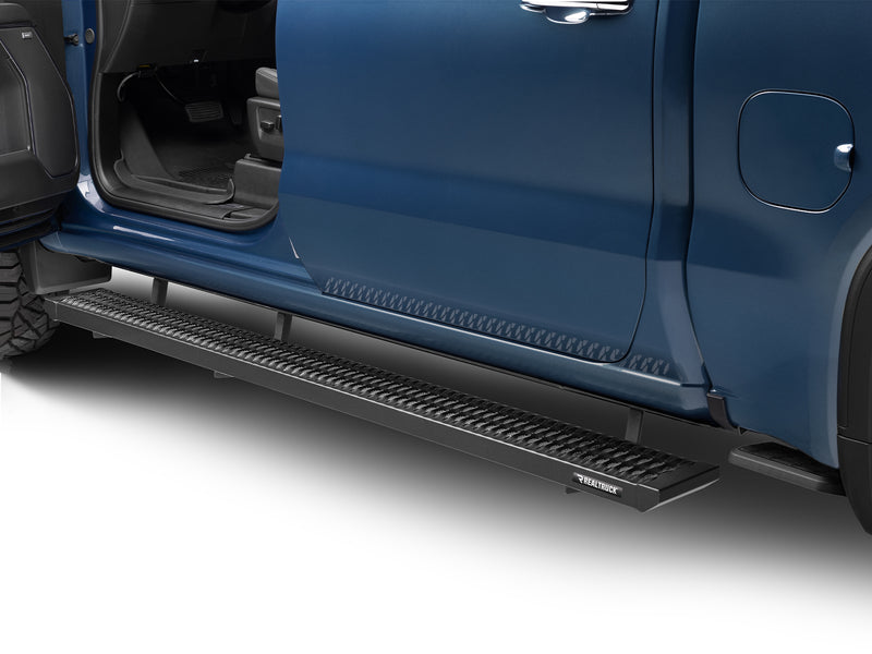N-Fab Growler Fleet side steps in textured black, installed along the rocker below an open door