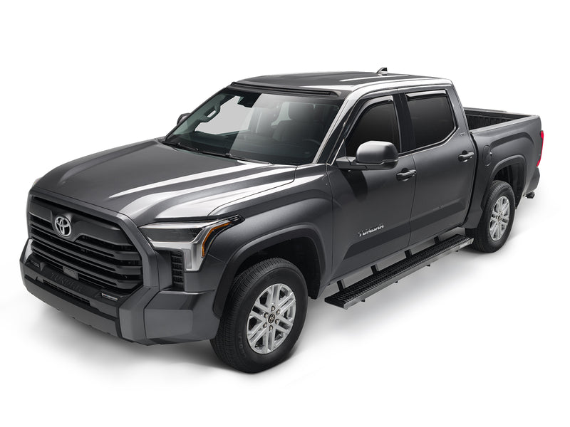 N-Fab Growler Fleet side steps in textured black, complete unit on white, on a Toyota Tundra