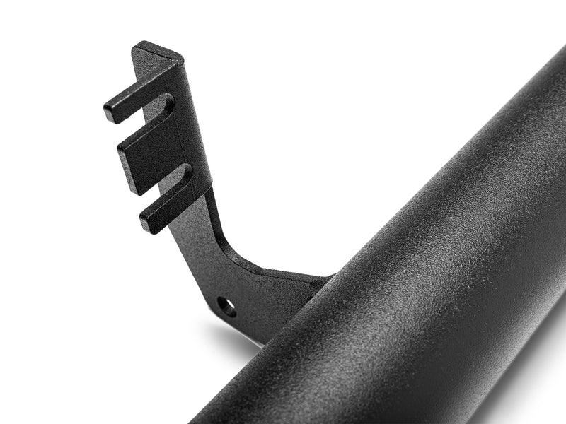 On-white close-up of a mounting bracket welded to the textured black main tube; brackets vary by vehicle
