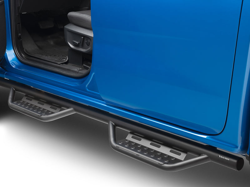 N-Fab Nerf Step RS step bars in textured black, installed along the rocker below an open door