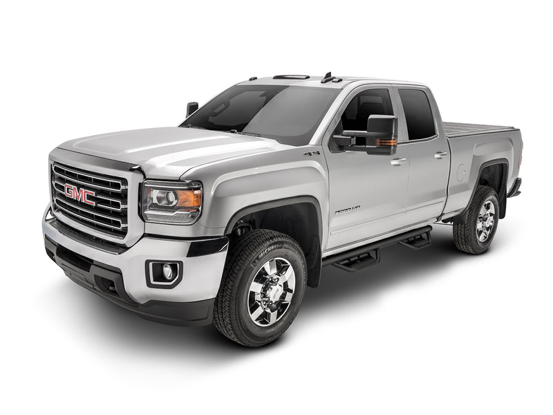 N-Fab Podium cab length steps in textured black, front three-quarter view, shown with a bed cover (not included), on a GMC Sierra 2500HD