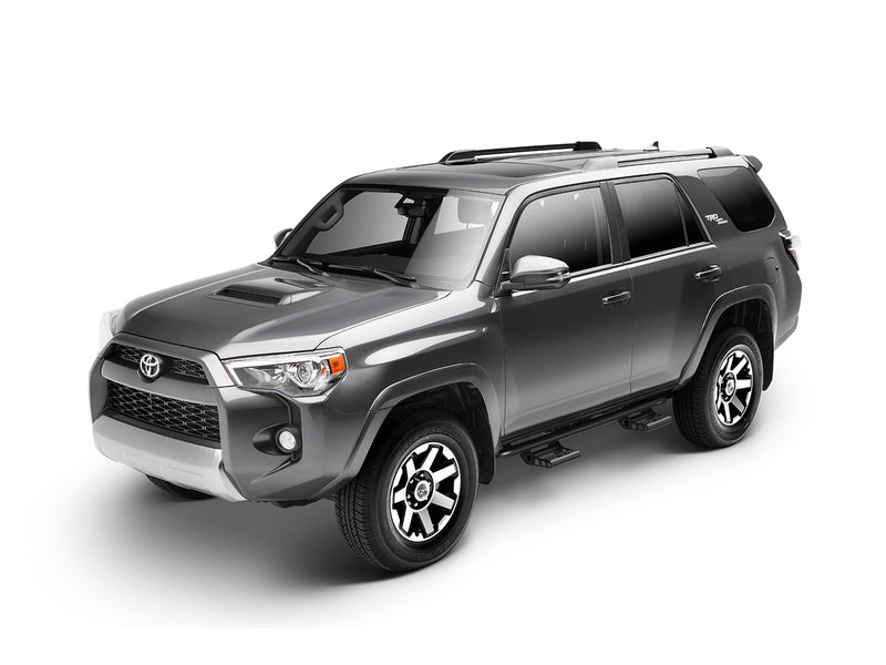 N-Fab RKR Step System in textured black, complete unit on white, on a Toyota 4Runner
