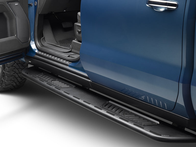 N-Fab Roan running boards in textured black, installed along the rocker below an open door