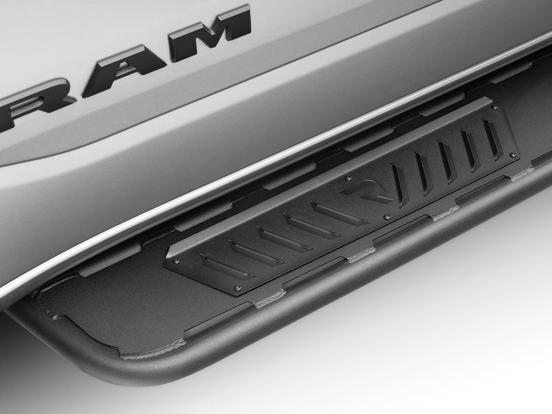 N-Fab Roan running boards in textured black, close view, installed along the rocker, on a Ram 1500