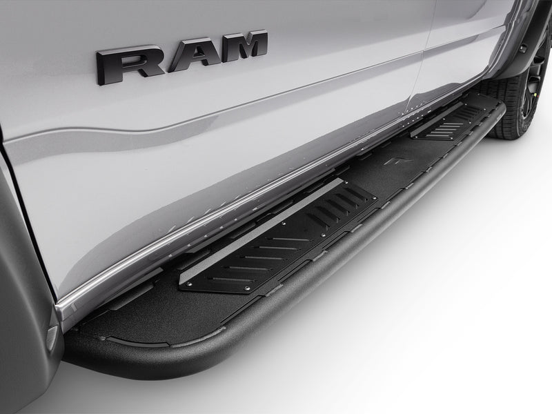 N-Fab Roan running boards in textured black, installed along the rocker, on a Ram 1500