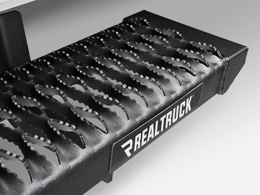 N-Fab Growler Fleet side steps in textured black, step tread macro
