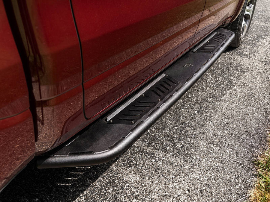 N-Fab Roan running boards in textured black, low view, installed along the rocker
