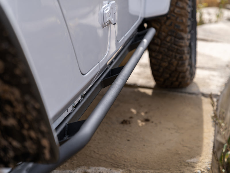 N-Fab TrailSlider step system in textured black, low view, installed along the rocker